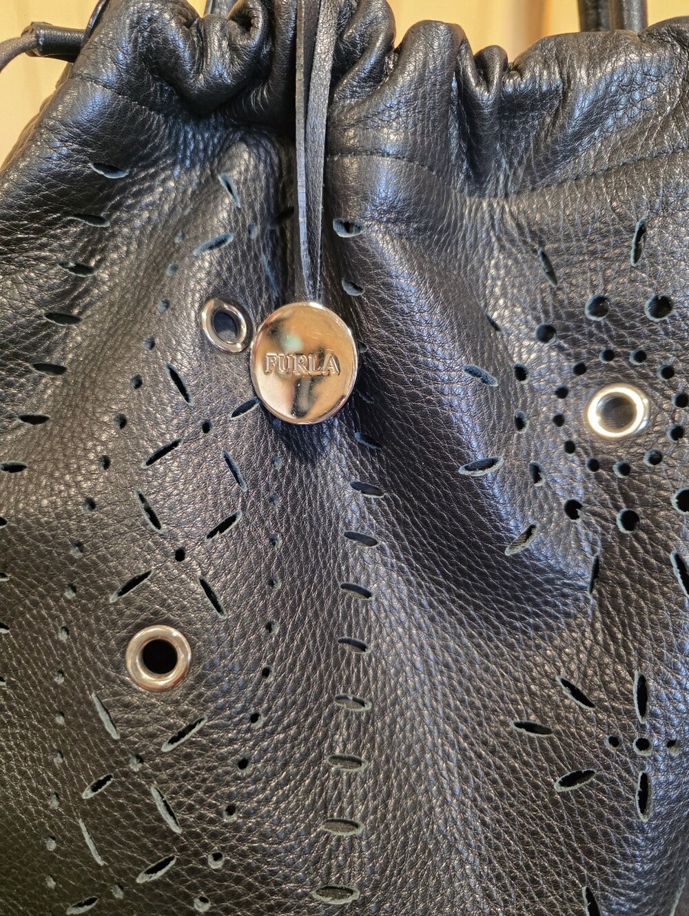 Furla Black Perforated With Grommets Pebbled Leather Drawstring Hobo
